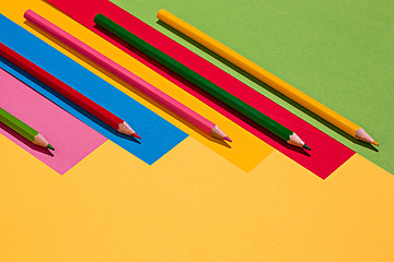 Image showing colored pencils and colour paper