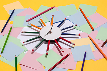 Image showing colored pencils and colour paper