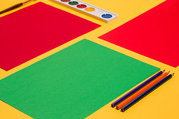 Image showing colored pencils and colour paper