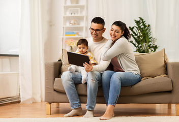 Image showing mother, father and baby with tablet pc at home