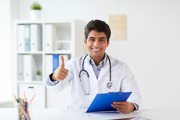 Image showing happy doctor at clinic showing thumbs up