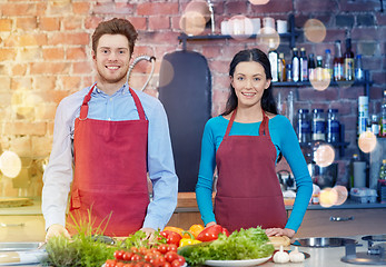 Image showing happy couple in kitchen at cooking class