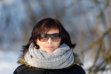 Image showing woman with sunglasses without makeup in winter time