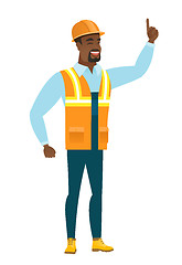Image showing African builder pointing with his forefinger.