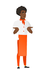 Image showing African confused chef cook shrugging shoulders.