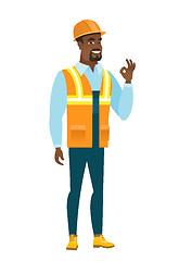 Image showing Smiling builder showing ok sign.