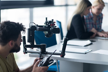 Image showing videographer at work