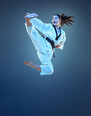 Image showing The karate girl with black belt