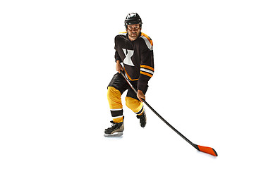 Image showing one caucasian man hockey player in studio silhouette isolated on white background