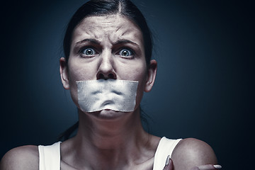 Image showing a young girl with a patch on her mouth