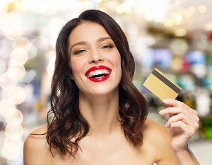 Image showing beautiful woman with red lipstick and credit card