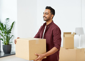 Image showing happy man with box moving to new home