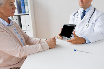 Image showing senior woman and doctor with tablet pc at hospital