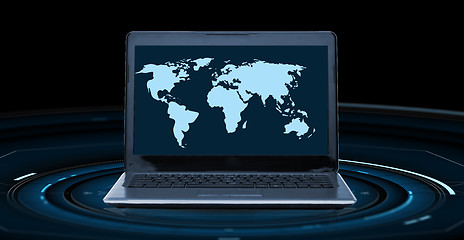 Image showing world map on laptop computer screen