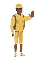 Image showing African traveler showing stop hand gesture.