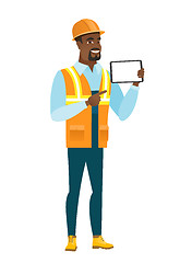 Image showing African-american builder holding tablet computer.