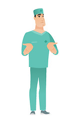 Image showing Caucasian confused doctor shrugging shoulders