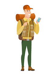 Image showing Caucasian traveler holding a mobile phone.