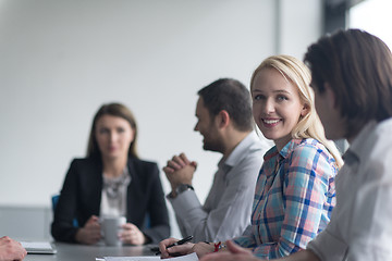 Image showing Group of young people meeting in startup office