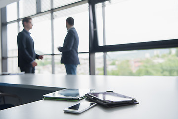 Image showing cloasing the deal in modern office interior