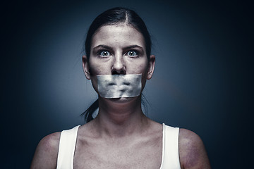 Image showing a young girl with a patch on her mouth