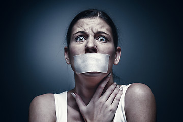 Image showing a young girl with a patch on her mouth