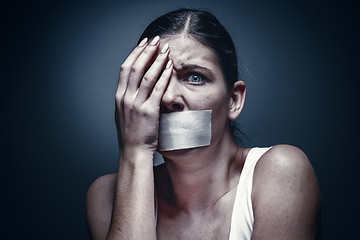 Image showing a young girl with a patch on her mouth