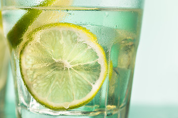 Image showing closeup of a cape cod cocktail or vodka cranberry on a blue background