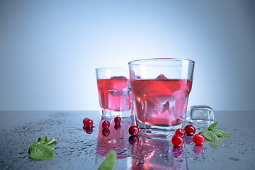 Image showing closeup of a cape cod cocktail or vodka cranberry on a blue background