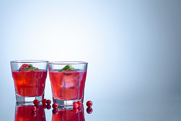 Image showing closeup of a cape cod cocktail or vodka cranberry on a blue background