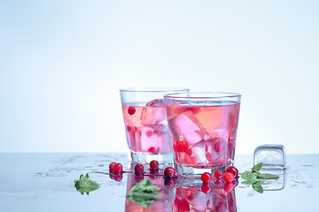 Image showing closeup of a cape cod cocktail or vodka cranberry on a blue background