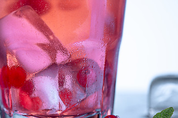 Image showing closeup of a cape cod cocktail or vodka cranberry on a blue background