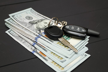 Image showing Heap of money and car key