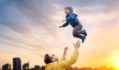 Image showing father with son playing and having fun outdoors