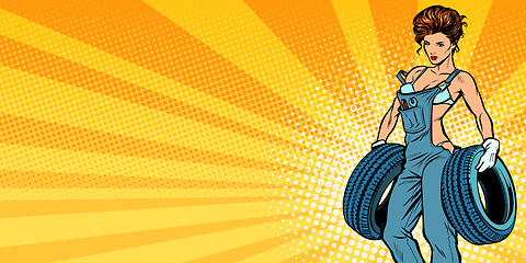 Image showing Sexy woman with tires, car service background