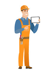 Image showing Smiling builder holding tablet computer.