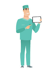 Image showing Smiling doctor holding tablet computer.