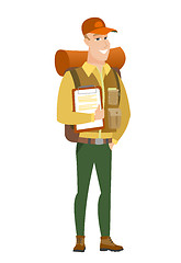 Image showing Traveler holding clipboard with papers.