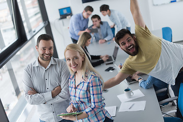 Image showing Two Business People Working With Tablet in office