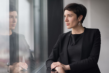 Image showing Portrait of successful Businesswoman by the window