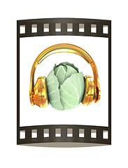 Image showing Green cabbage with headphones on a white background. 3d illustra