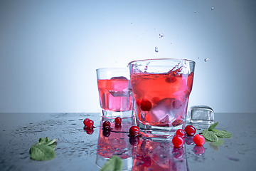 Image showing closeup of a cape cod cocktail or vodka cranberry on a blue background