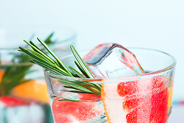 Image showing closeup of a cape cod cocktail or vodka cranberry on a blue background