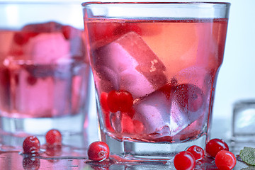 Image showing closeup of a cape cod cocktail or vodka cranberry on a blue background