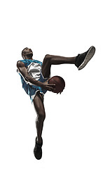 Image showing Full length portrait of a basketball player with ball