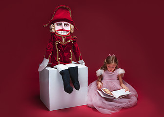 Image showing The beauty ballerina sitting with nutcracker