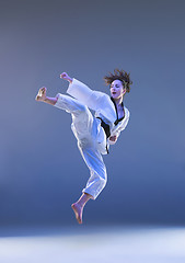 Image showing The karate girl with black belt