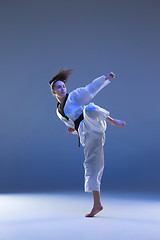 Image showing The karate girl with black belt