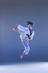 Image showing The karate girl with black belt