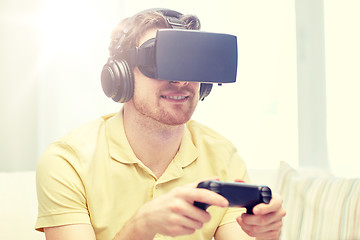 Image showing man in virtual reality headset with controller